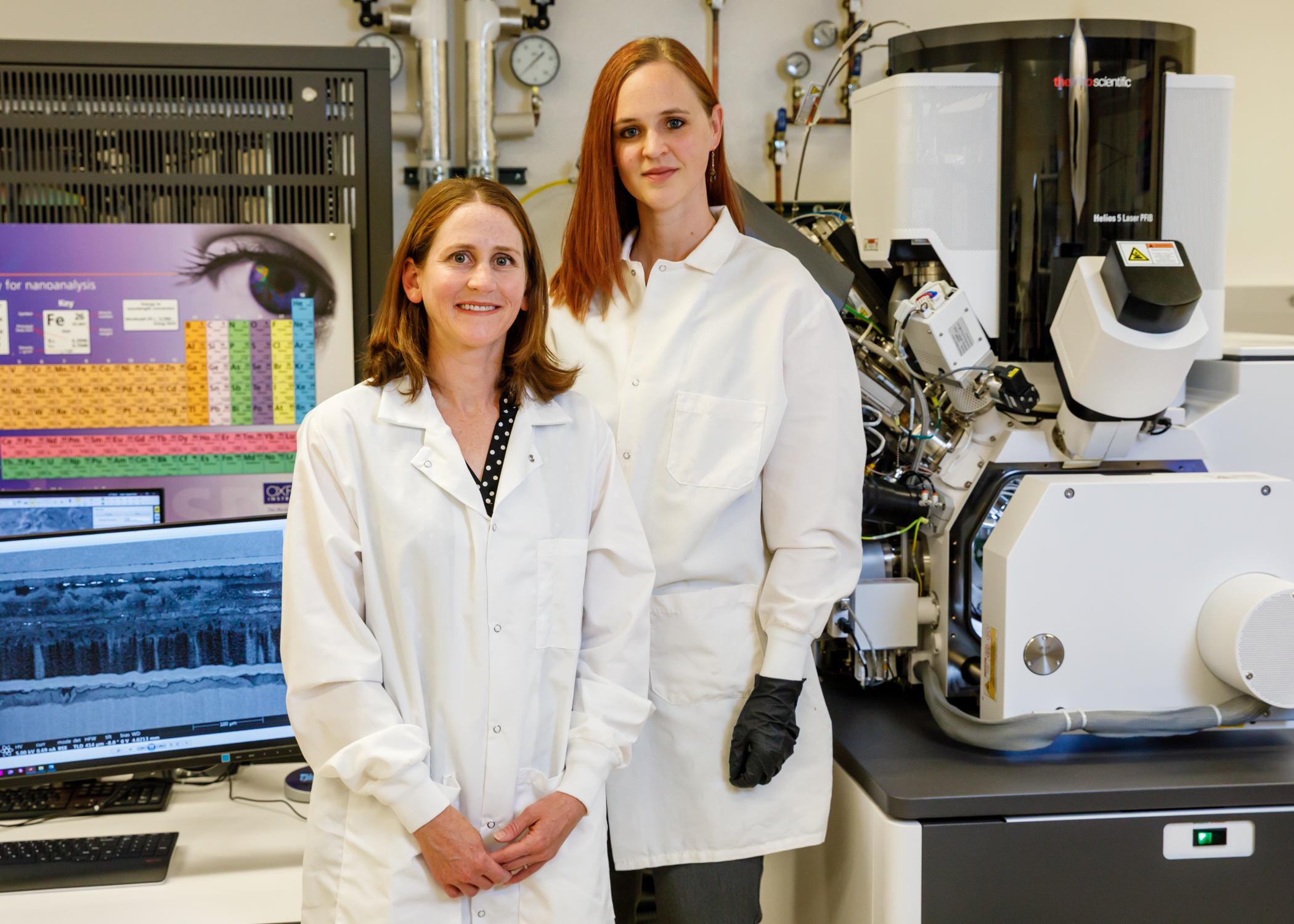 Sandia National Laboratories scientists Katie Harrison, left, and Katie Jungjohann have pioneered a new way to look inside batteries to learn how and why they fail. (Photo by Bret Latter)