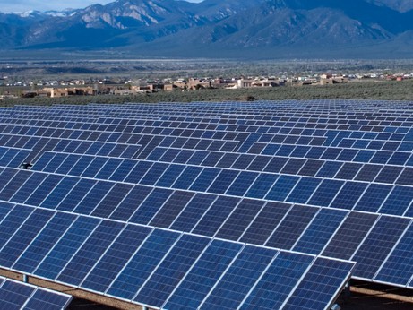 Image of PV Panels and mountains in background