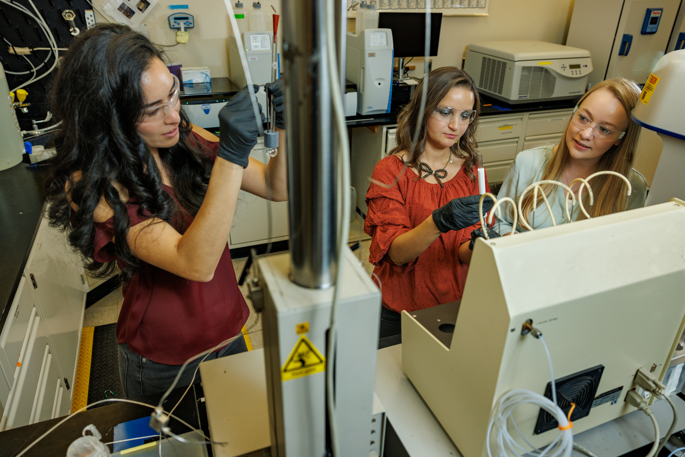 Nuclear Energy staff work in laboratory at Sandia