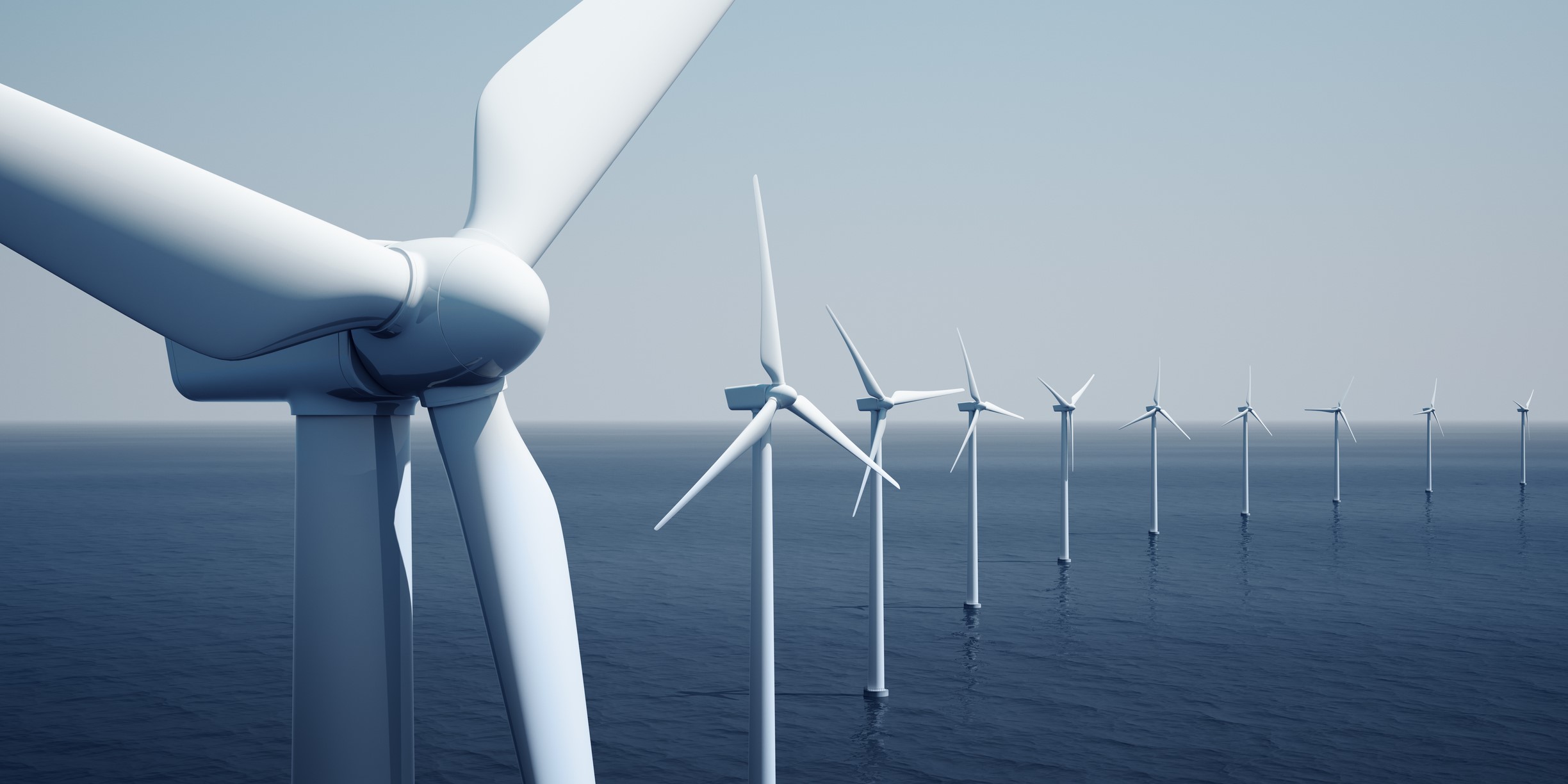 Offshore Wind Turbines lined up out at sea