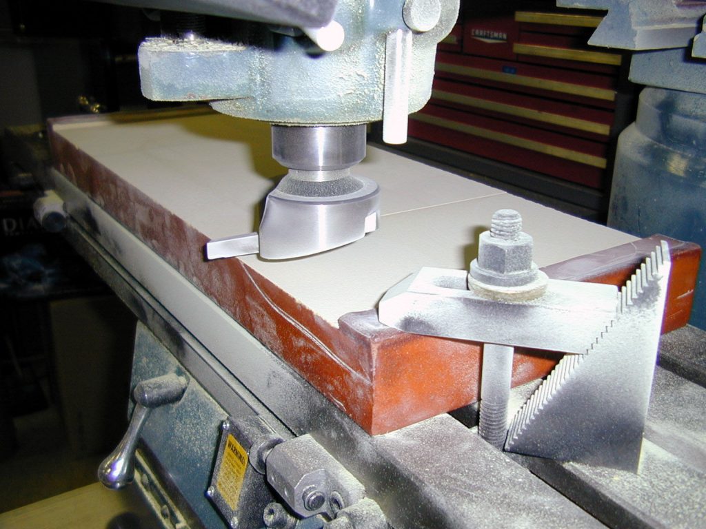 TEPIC can be machined using a variety of common tools including: fly cutter (shown), mill, lathe, bandsaw and sander.