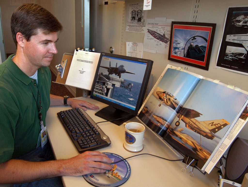 System review — Sandia engineer Jeff Brewer uses a “system of systems” approach to help the U.S. Navy create the next generation of aircraft carriers.