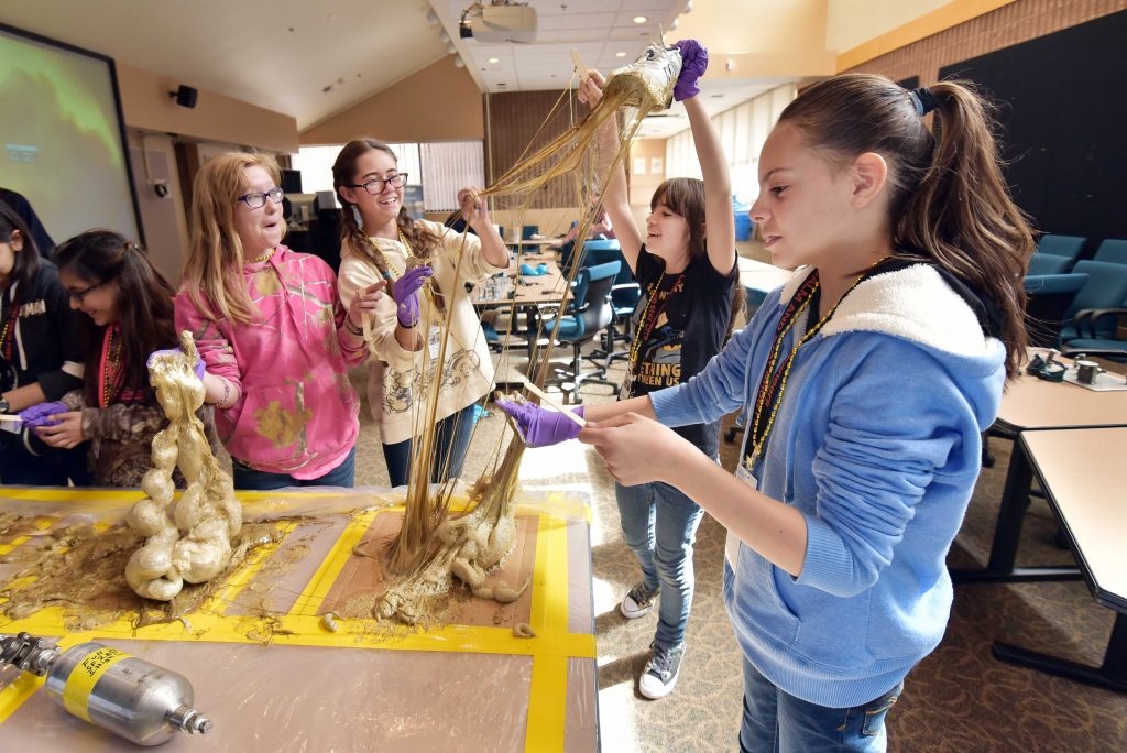 Students learned about sticky foam during the Sandia National Laboratories STEM Day in 2017. Sticky foam was first developed at Sandia in the late 1970s and used for security applications. (Photo by Randy Montoya) Click the thumbnail for a high-resolution image.