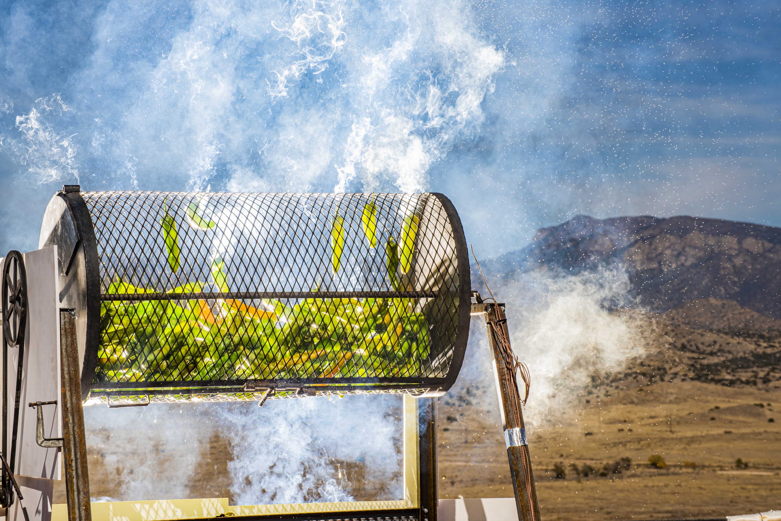 Roasting green chile on top of Sandia National Laboratories’ National Solar Thermal Test Facility. Roasting green chile with concentrated sunlight instead of propane produces flavorful chile and reduces carbon dioxide emissions. Members of the media interested in b-roll of the experiment, may download the video here.