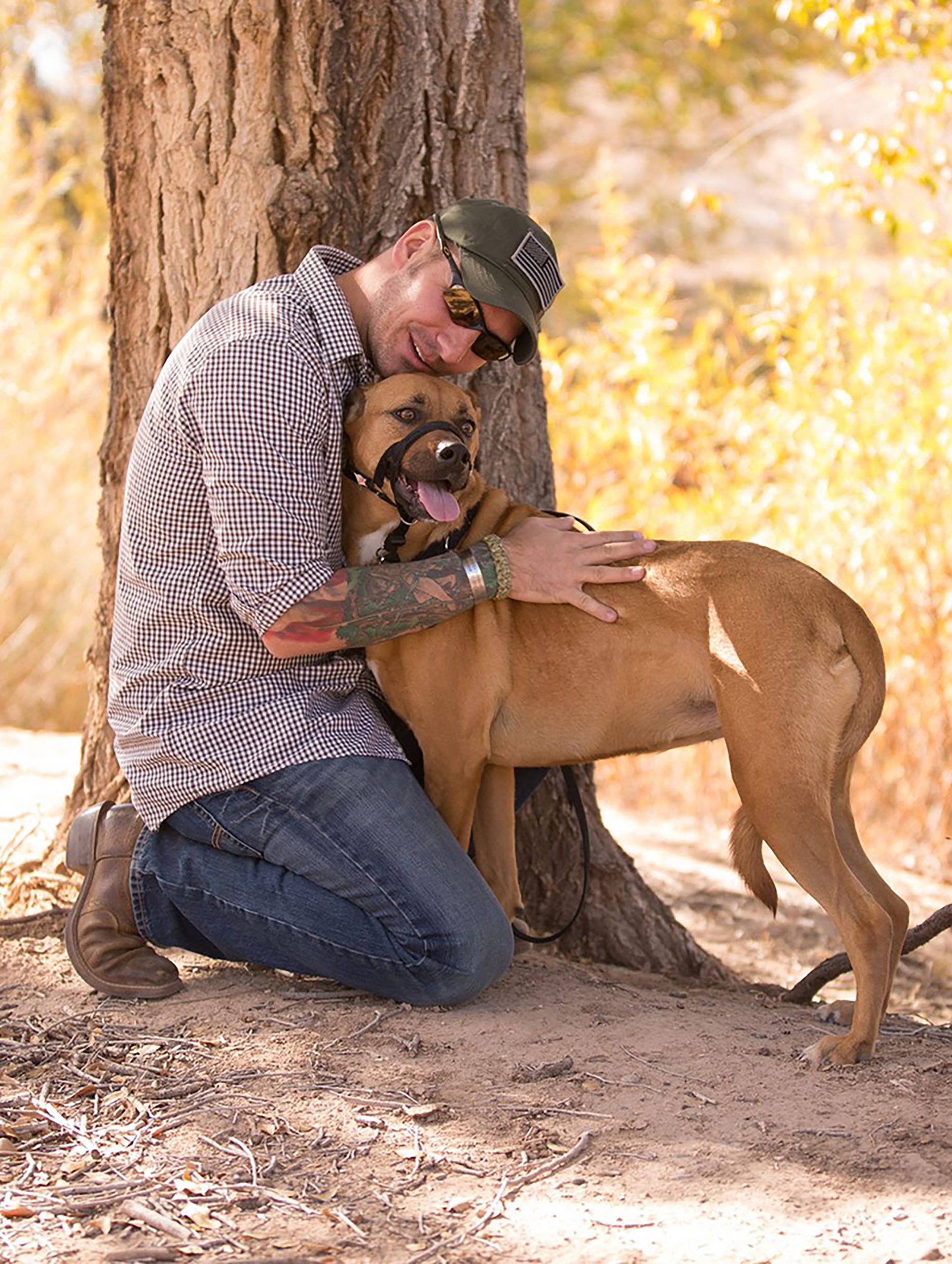 Rob Mitchell and his service dog, Hunni