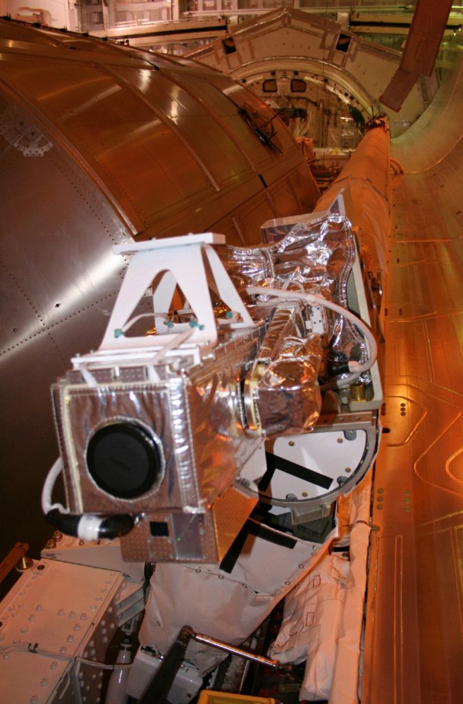 Sandia’s orbitor inspection sensor was attached to Discovery's robotic arm.