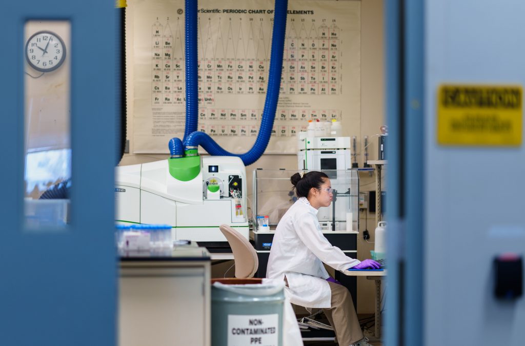 Sandia National Laboratories intern Kadie Marie Mei Sanchez works on a mass spectrometer used for quantifying the concentration of metals, such as the rare-earth elements separated by the tailored MOFs. (Photo by Craig Fritz) Click on the thumbnail for a high-resolution