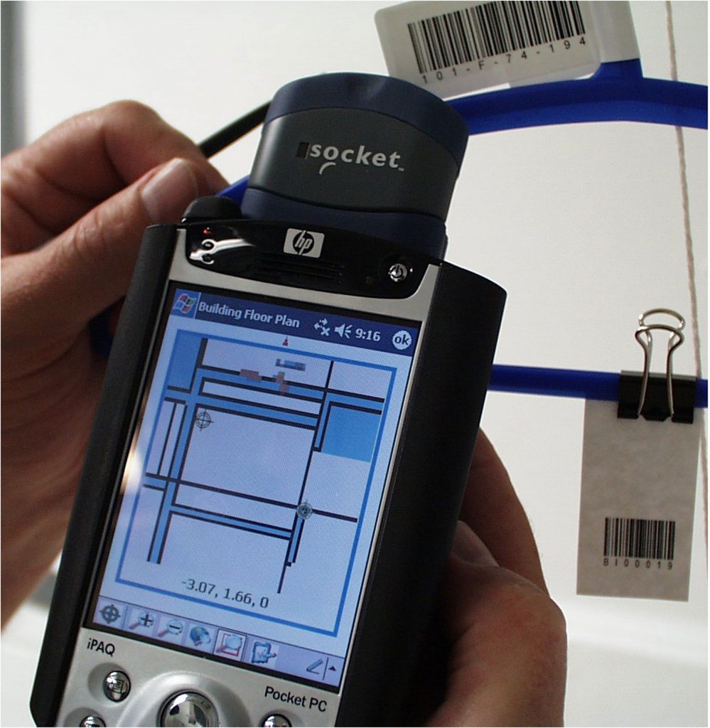 The handheld device displays building floor plans and collected samples. Barcodes and other relevant sample data (i.e., type) are recorded and later transferred to the BROOM database.