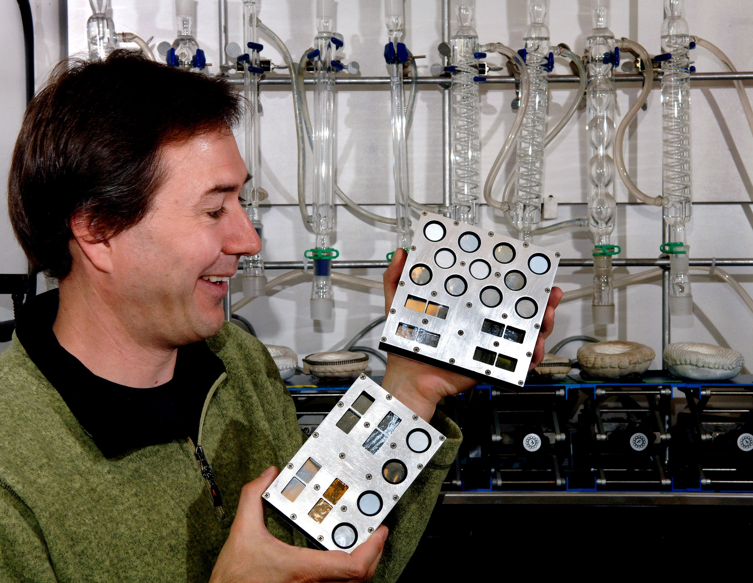 MAT CELINA displays the piezoelectric polymer films that will be tested on an upcoming Materials International Space Station Experiment.