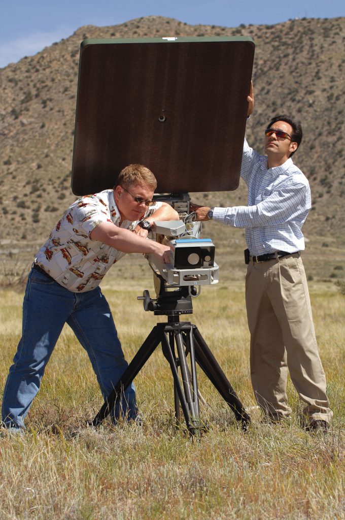 Nonlethal weaponry — Sandia researchers Willy Morse and James Pacheco fine-tune the small-sized Active Denial System.