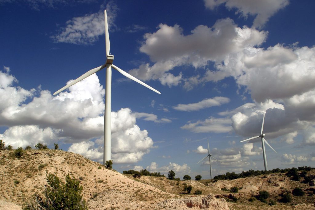 TURBINES SPIN at the New Mexico Wind Energy Center, located 170 miles southeast of Albuquerque and 20 miles northeast of Fort Sumner.