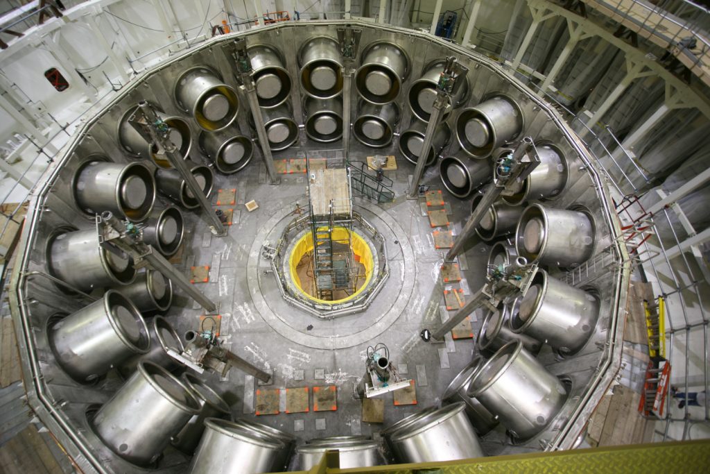 Sandia’s Z machine during the renovation process, its huge  conduits being readied to focus an even more massive electrical current  on a target approximately the size of a spool of thread.