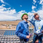 Cliff Ho and Sen. Martin Heinrich on top of the solar tower