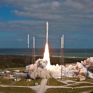 NASA’s Mars Science Laboratory spacecraft, sealed inside its payload fairing atop a United Launch Alliance Atlas V rocket, clears the tower at Space Launch Complex 41 at Cape Canaveral Air Force Station in Florida. (Photo courtesy of United Launch Alliance)