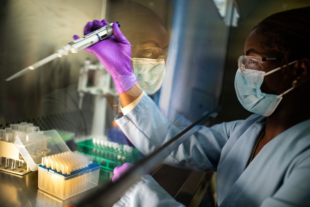 INTERN OUTPUT — Brooke Davis, a molecular and microbiology summer intern from University of Arkansas at Pine Bluff, prepares algae samples for a microbiome investigation at Sandia.(Photo by Craig Fritz)