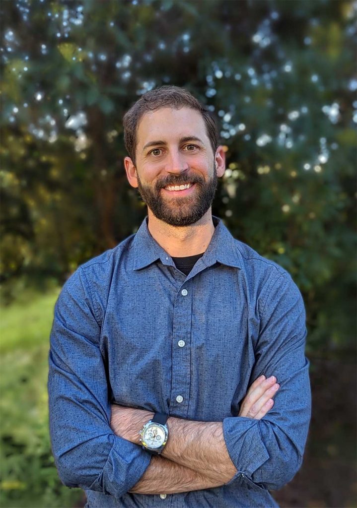 COMPUTATIONAL EFFICIENCY — Mitch Wood, a computer scientist in the computational multiscale department, received a DOE Early Career Research Award for his research on materials science and machine learning. (Photo courtesy of Mitch Wood)