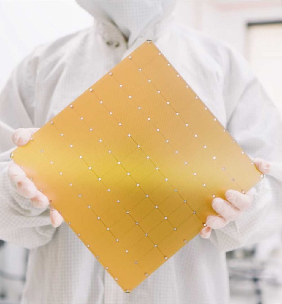 COMPUTING PARTNERS — A worker at Cerebras Systems holds the world’s largest computer wafer, to be used as part of the collaboration between Cerebras and three national labs. The partnership will accelerate future advanced simulation and computing applications in support of the national nuclear stockpile. (Photo courtesy of Cerebras Systems)