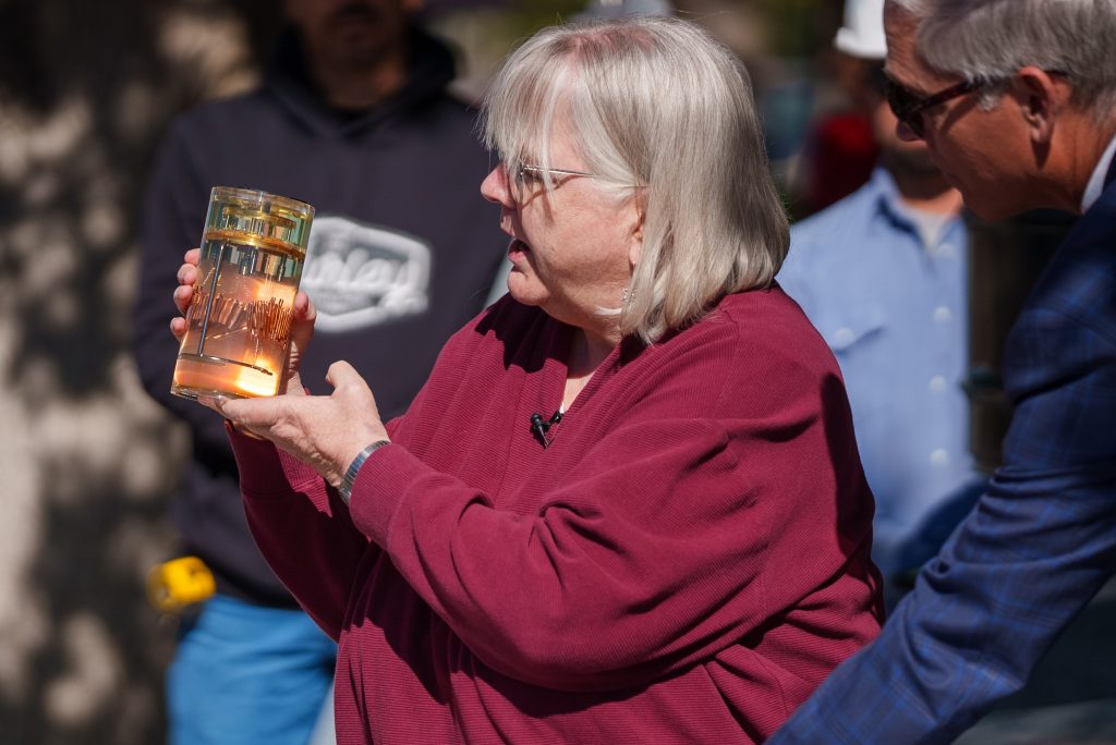 Z ARRAY — Labs historian Rebecca Ullrich lifts a Z array from the 50th anniversary time capsule. Z arrays were previously used in Z machine testing. (Photo by Craig Fritz)