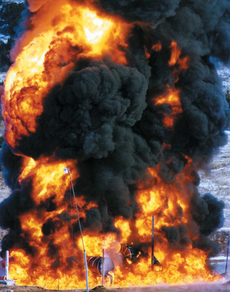 TESTING THROUGH FIRE — A TRUPACT-II container undergoes a fire-test with the goal of surviving 1,475 degrees Fahrenheit for at least 30 minutes without losing vacuum. (Photo from the Lab News archives)